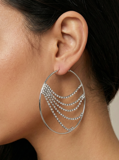 Silver hoop earring with dangling beads 
